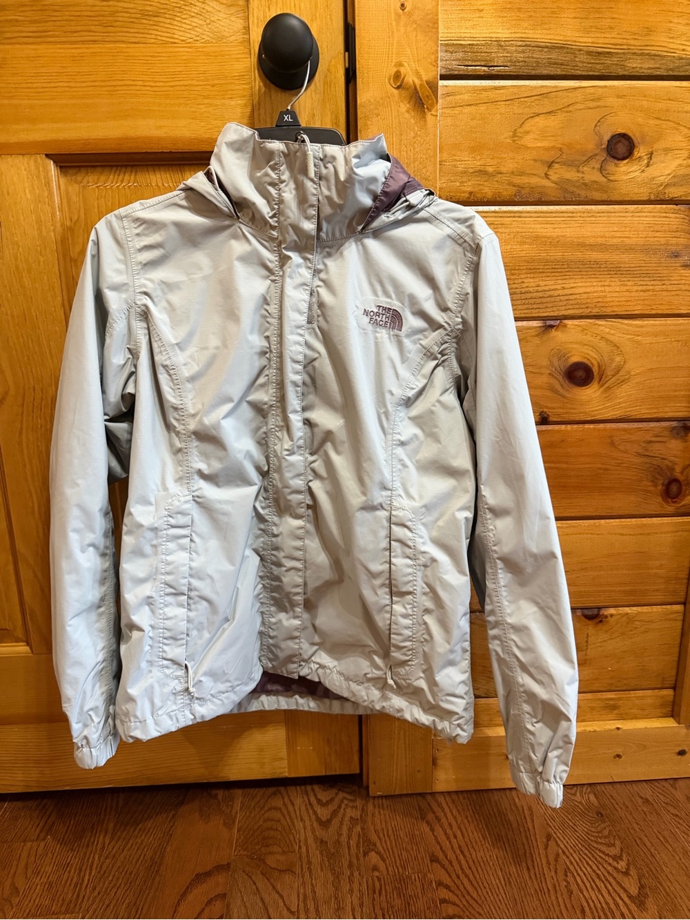 The North Face Women's Light Gray With Purple Stitch Rain Jacket
